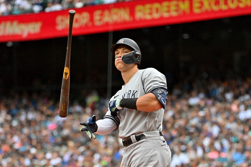 45 - Aaron Judge tosses his as his 45th home run of the season put him four ahead of where Roger Maris was through 112 games in 1961.