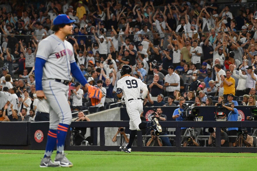 48 - Aaron Judge rounds the bases in the fourth inning after a homer against the New York Mets Tuesday, Aug. 23.