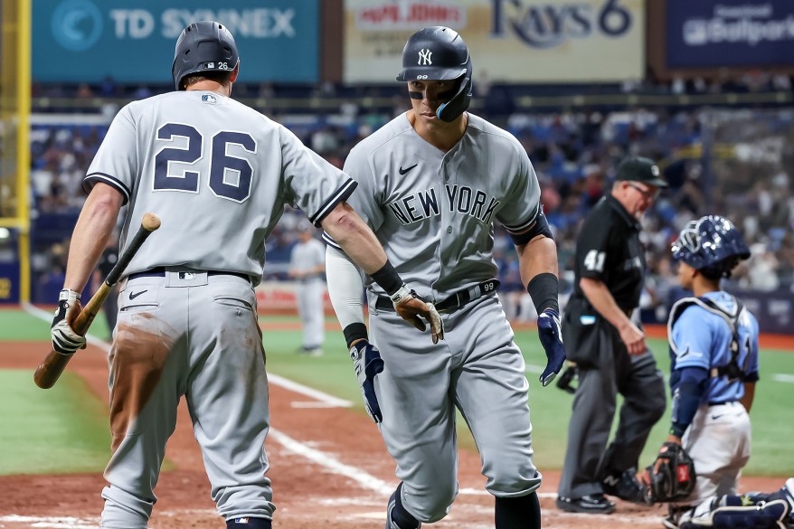 52 - Aaron Judge is congratulated by DJ LeMahieu after Judge's home run against the Tampa Bay Rays during the ninth inning Sept. 3.