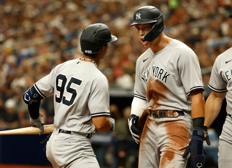 53 - Aaron Judge celebrates as he scores a run on shortstop Oswaldo Cabrera (95) sacrifice RBI against the Tampa Bay Rays.