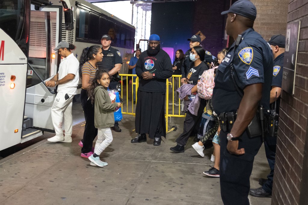 MIgrants arrive in New York City's Port Authority Terminal after being sent from Texas by Governor Abbot.