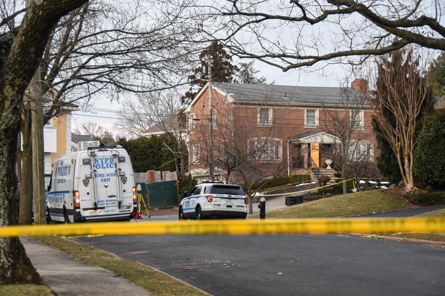 A picture of police at the scene of the crime where mafia boss Frank Cali was gunned down.