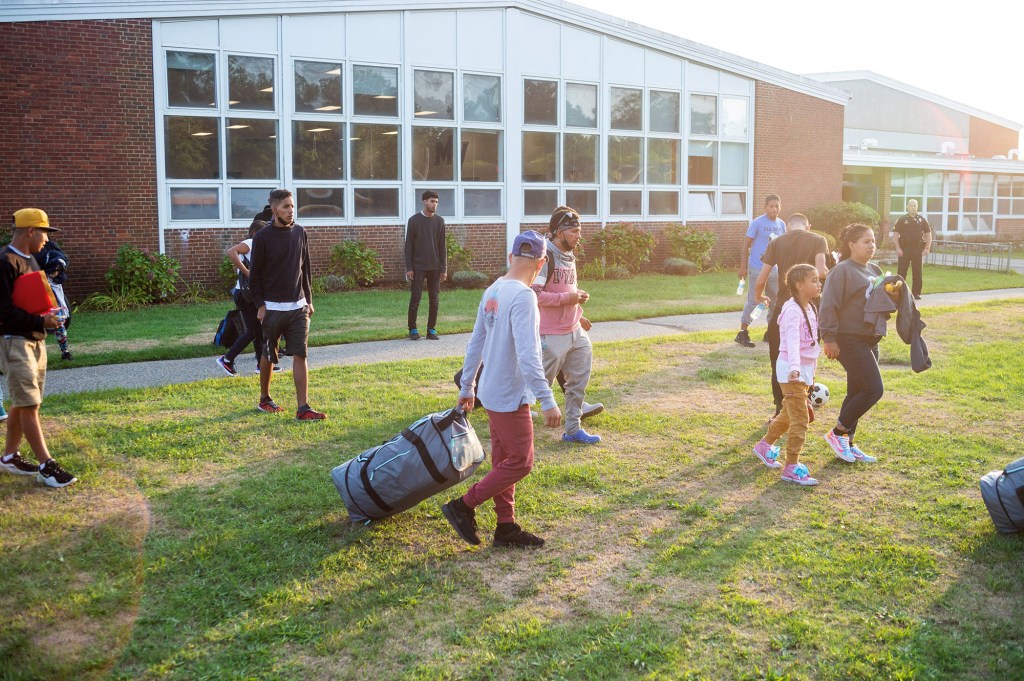 The migrants were taken to a local church and offered food, medical care and other services. 