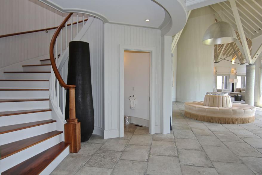 Former President Barack Obama’s home features a fancy staircase.