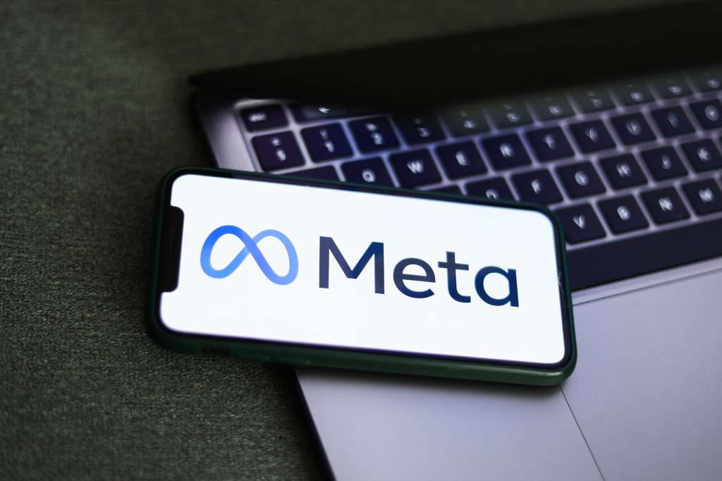 Meta logo displayed on a phone