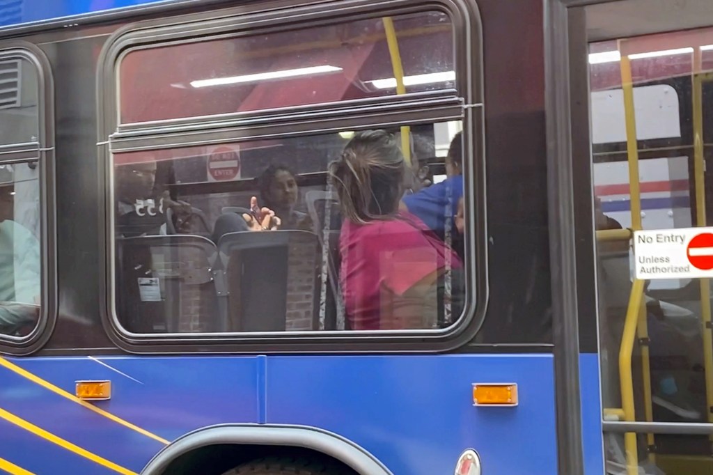 Migrants on MTA bus