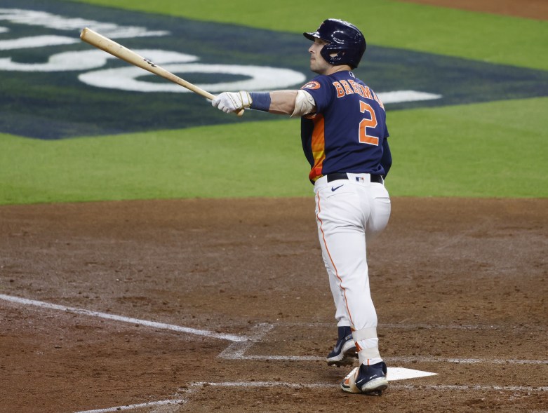 The Houston Astros' Alex Bregman hits a three-run home run to give the Astros a 3-0 lead over the New York Yankees in ALCS Game 2 on Oct. 20, 2022 in Houston.