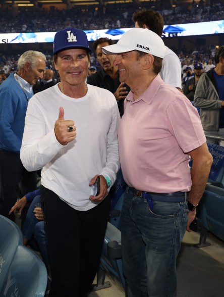 Rob Lowe and Peter Guber, owner of the Los Angeles Dodgers, attend NLDS Game 1 on Oct. 11, 2022 in Los Angeles.