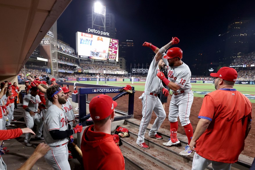 Kyle Schwarber of the Philadelphia Phillies celebrates with teammates after hitting a home run against the San Diego Padres during the NL Championship Series on Oct. 18, 2022 in San Diego.