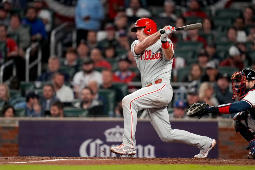 Philadelphia Phillies catcher J.T. Realmuto watches his single against the Atlanta Braves in the fourth inning during game two of the NLDS MLB Playoffs on Oct. 12, 2022.