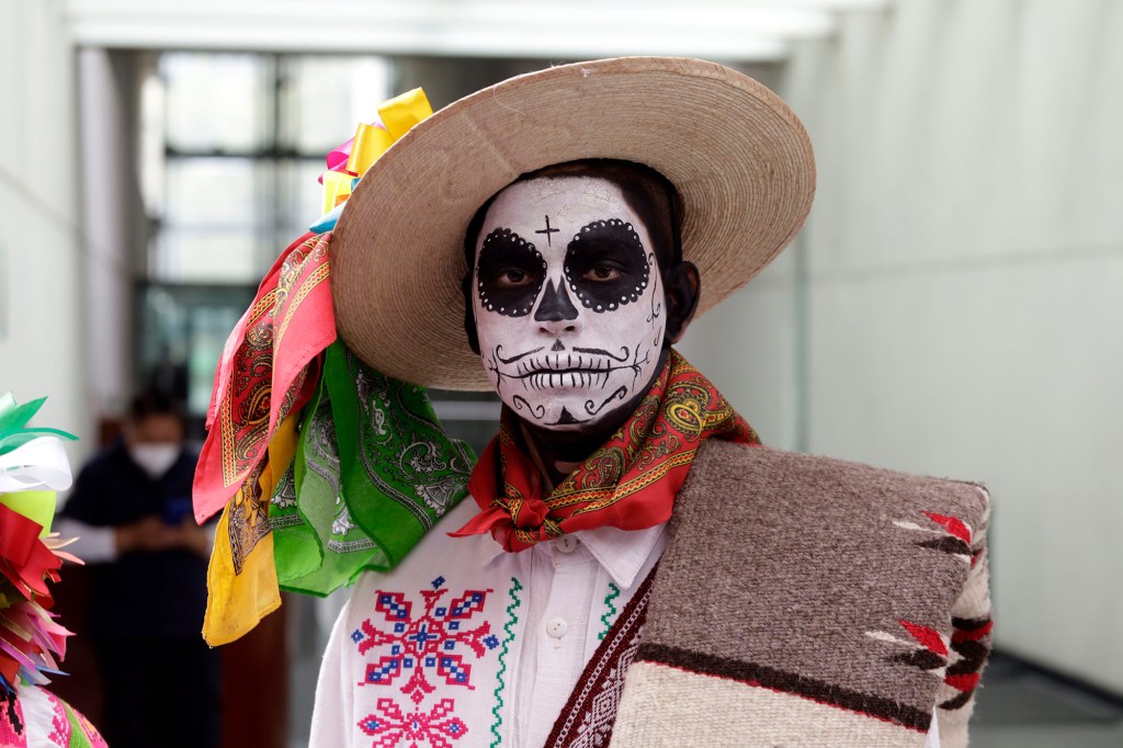 A man characterized  as skull to promote Mexican Dia de Muertos visit the Senate of the Republic in Mexico City. on October 11, 2022 in Mexico City, Mexico. (Photo credit should read Luis Barron/Future 