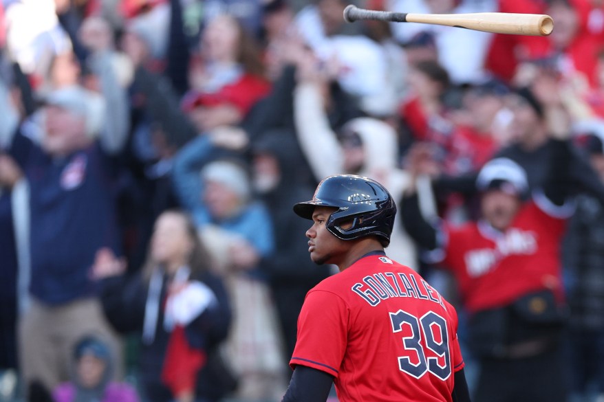 Cleveland Guardian Oscar Gonzalez stares at his home run that ended a 15-inning game and propelled the Guardians to a 1-0 victory over the Tampa Bay Rays on Oct. 8, 2022.