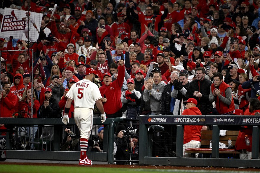 Cardinals' Designated Hitter Albert Pujols walks back to the dugout after his final Major League at-bat on Oct. 8, 2022.