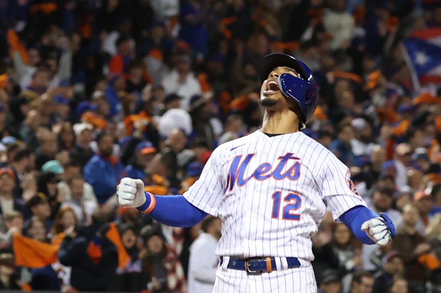 NY Mets' Francisco Lindor celebrates after hitting a solo home run in the Mets' 7-3 victory on Oct. 8, 2022.