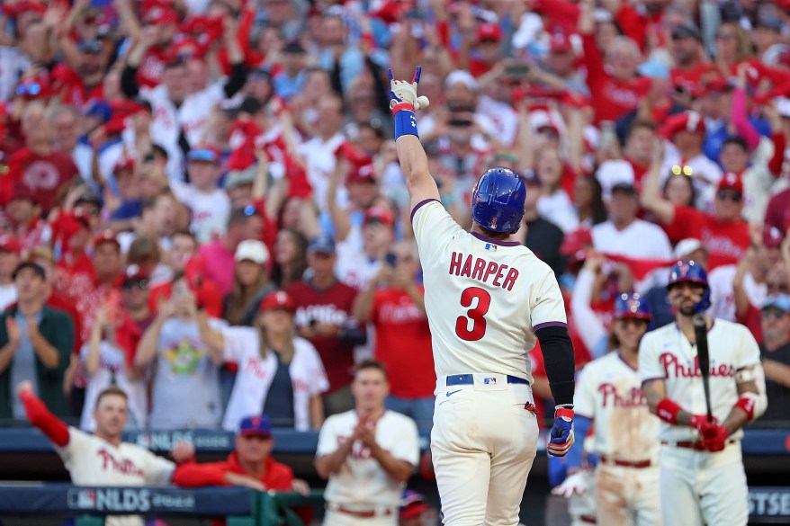 Bryce Harper celebrates after hitting a home run in the Phillies' Game 4 win over the Braves on Oct. 15, 2022.