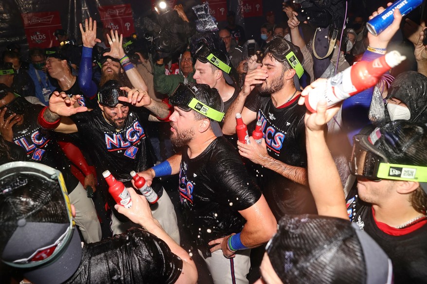 The Philadelphia Phillies celebrate after defeating the Braves in Game 4 of the NLDS to advance to the Championship series on Oct. 15, 2022.