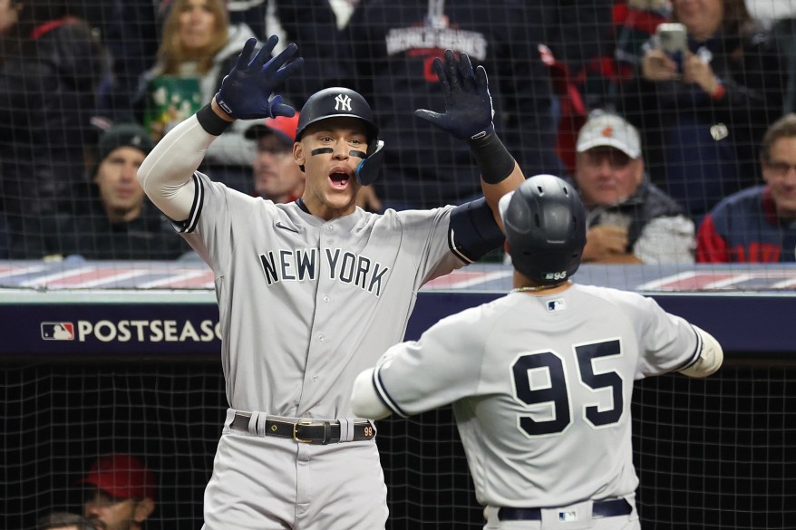 Aaron Judge and Oswaldo Cabrera celebrate after Cabrera's home run in Game 3 of the ALDS on Oct. 15, 2022.