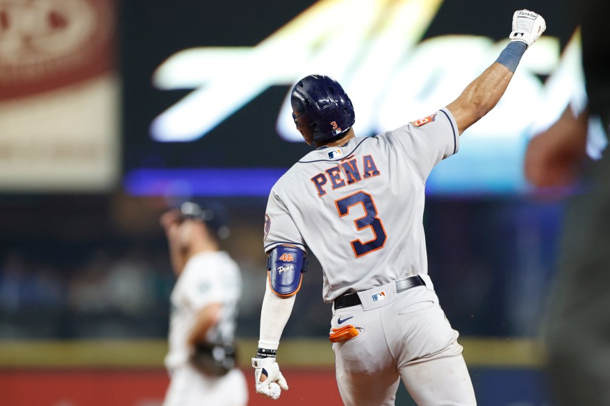 Jeremy Pena celebrates after hitting a home run in an 18-inning long game against the Mariners on Oct. 15, 2022.