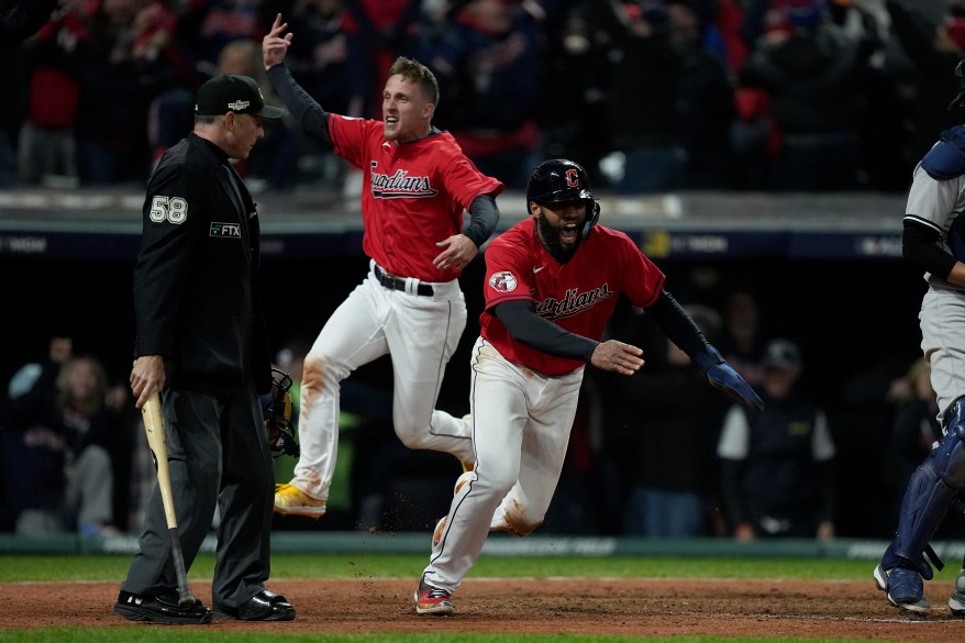 The Cleveland Guardians celebrate after walking-off against the Yankees to win Game 3 of the ALDS on Oct. 15, 2022.