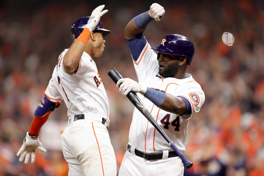 Jeremy Pena celebrates a home run with Yordan Alvarez during the seventh inning against the New York Yankees in game one of the AL Championship Series at Minute Maid Park on Oct. 19, 2022 in Houston.