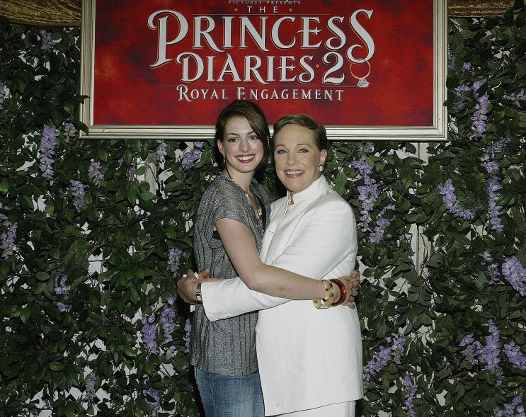 Julie Andrews stands alongside co-star Anne Hathaway at the premiere of "The Princess Diaries 2: Royal Engagement" in 2004.