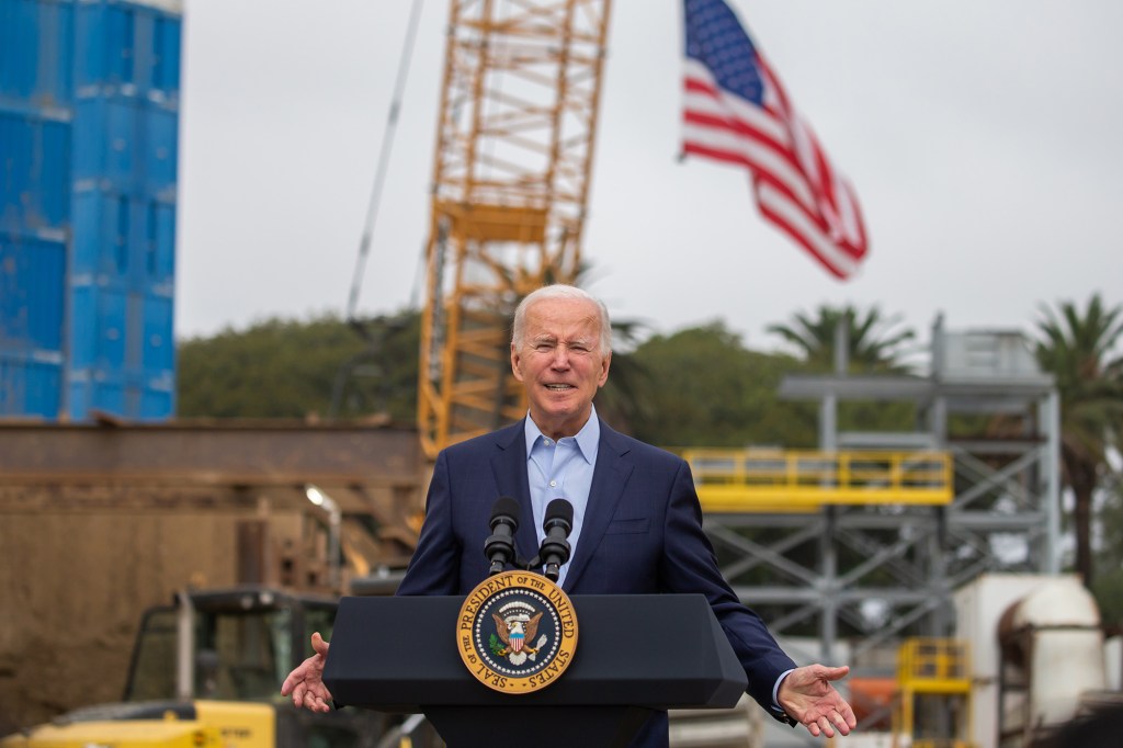 Biden delivers remarks at a transit project site in Los Angeles on October 13.