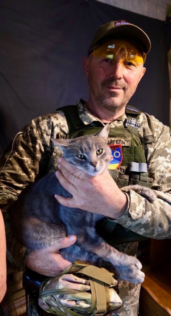 Among the individuals Seggos met on the front lines: A TDF soldier and his cat mascot.