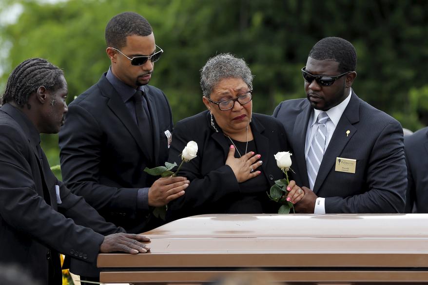 Family mourns during the funeral for one of Mother Emanuel AME Church victims.