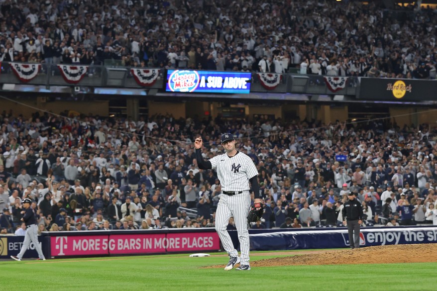 New York Yankees starting pitcher Gerrit Cole gestures to the crowd as he walks back to the dugout after the sixth inning in ALDS Game 1 on Oct. 11, 2022 in New York.