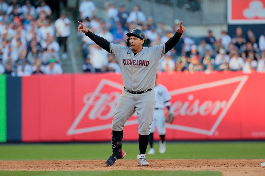 The Cleveland Guardians' Josh Naylor gestures after doubling in the 10th inning of ALDS Game 2 on Oct. 14, 2022 in New York.