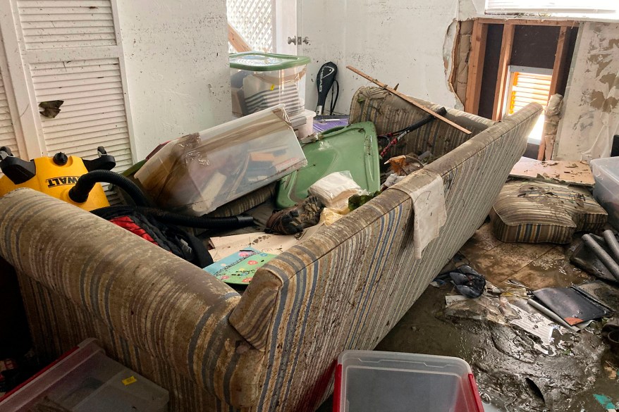 Damaged furniture and household items after Hurricane Ian passed through are shown in a home in Sanibel Island.