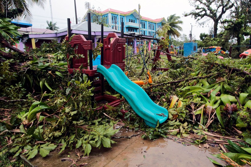 Trees that were knocked down from the powerful Hurricane Julia are shown in a playground in Bluefields, Nicaragua.