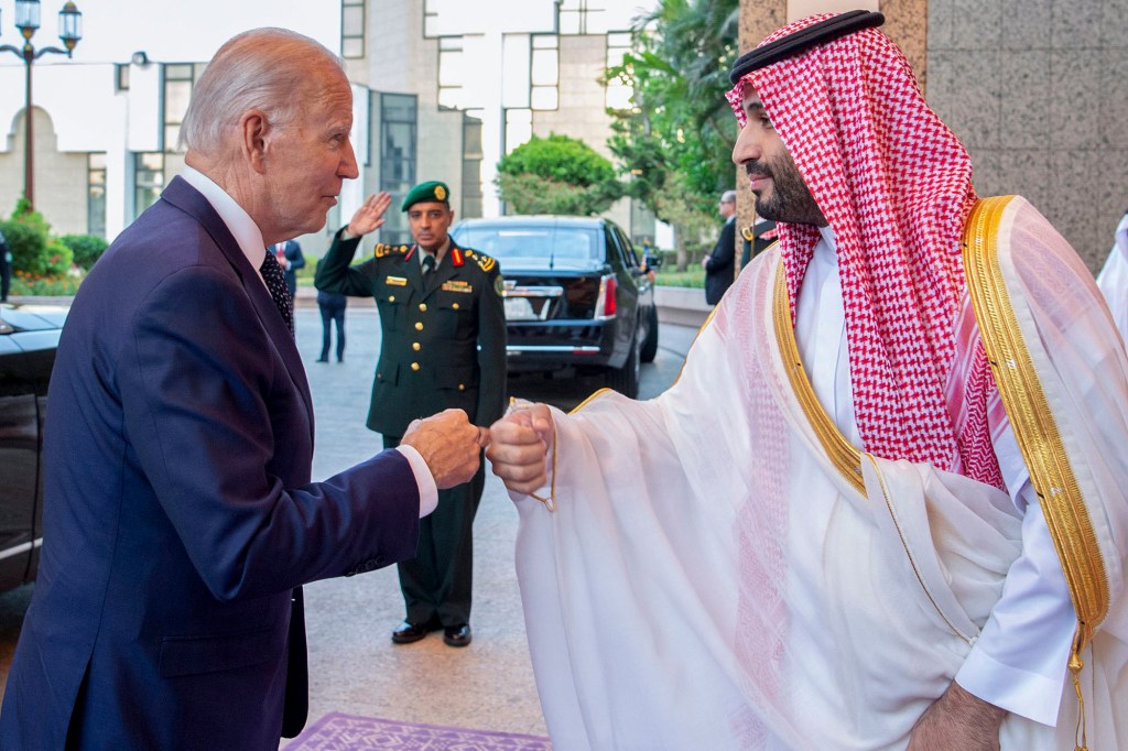 Saudi Crown Prince Mohammed bin Salman, right, greets President Joe Biden with a fist bump after his arrival at Al-Salam palace in Jeddah.