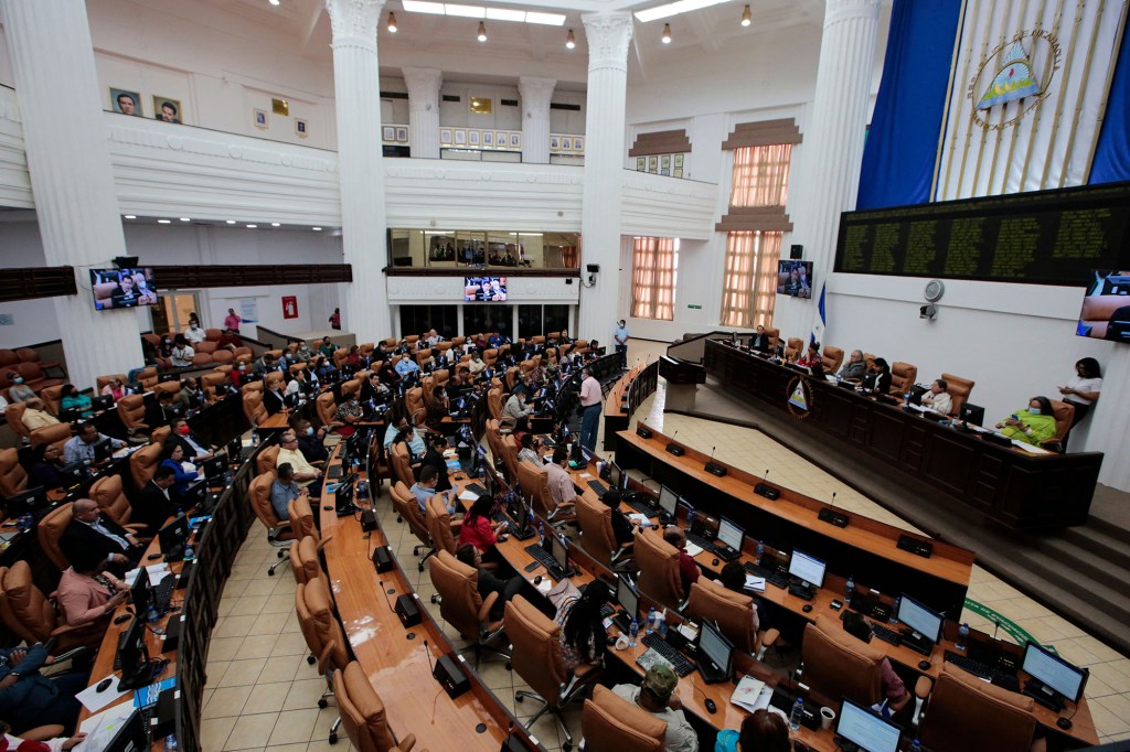 Nicaraguan congressmen participate in a parliamentary session at the National Assembly building in Managua.