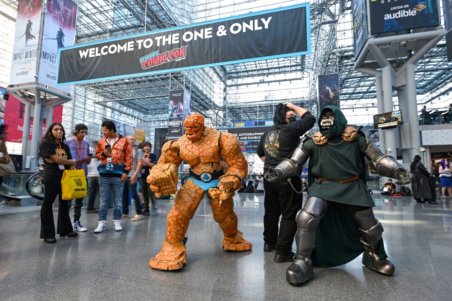 Cosplayers dressed as The Thing and Dr. Doom