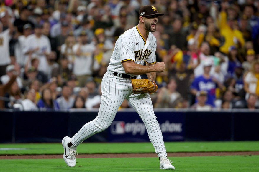 The San Diego Padres' Nick Martinez celebrates after throwing out Chris Taylor to end the sixth inning in NLDS Game 3 on Oct. 14, 2022 in San Diego, California.