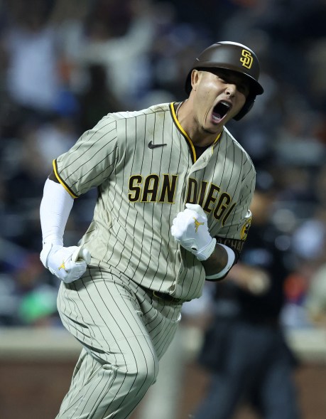 Manny Machado of the San Diego Padres reacts after hitting a solo home run against the New York Mets in the fifth inning of NL Wild Card Game 1 on Oct. 7, 2022 in Flushing.