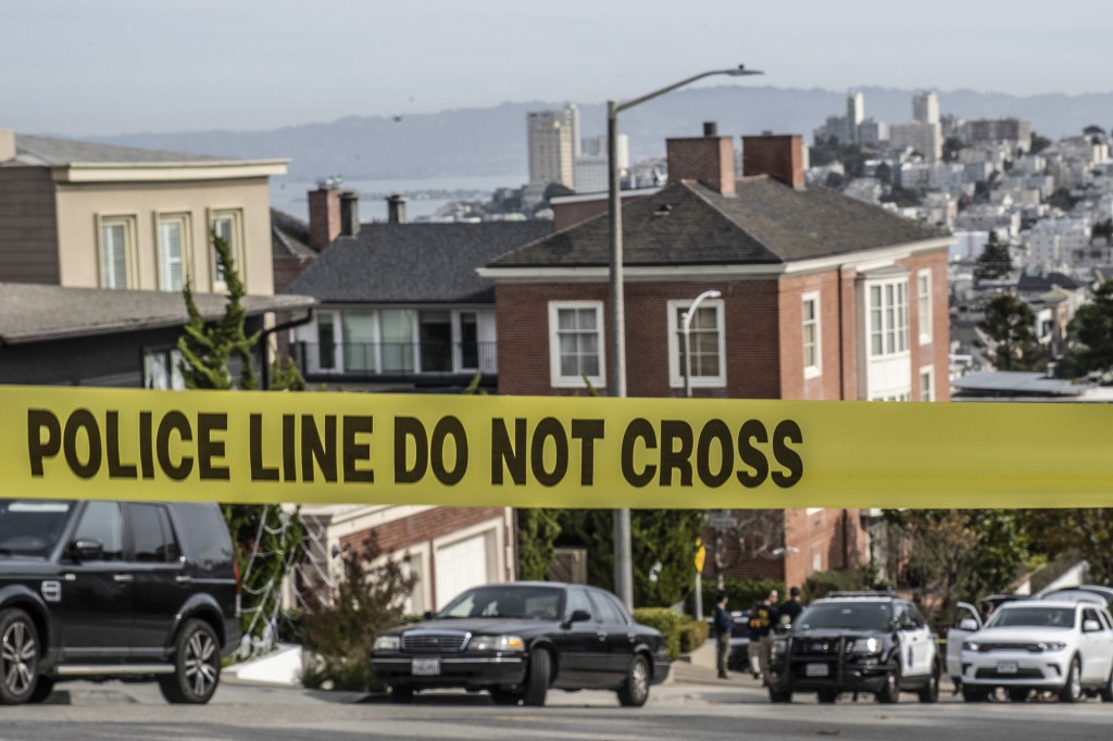 Police tape closes a block of Broadway Street