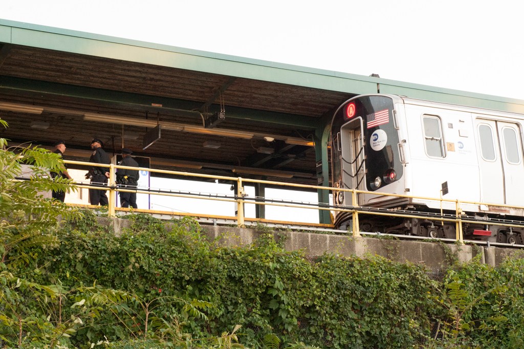 NYPD at the scene of the fatal shooting on the A train in Far Rockaway, Queens on October 14, 2022.