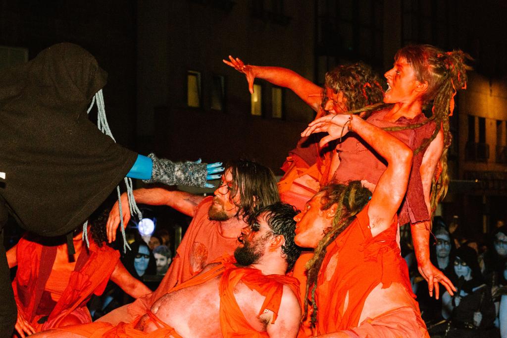  Red painted dancers perform in front of a crowd of thousands during the 2015 Samhuinn Fire Festival in Edinburgh's Grassmarket.