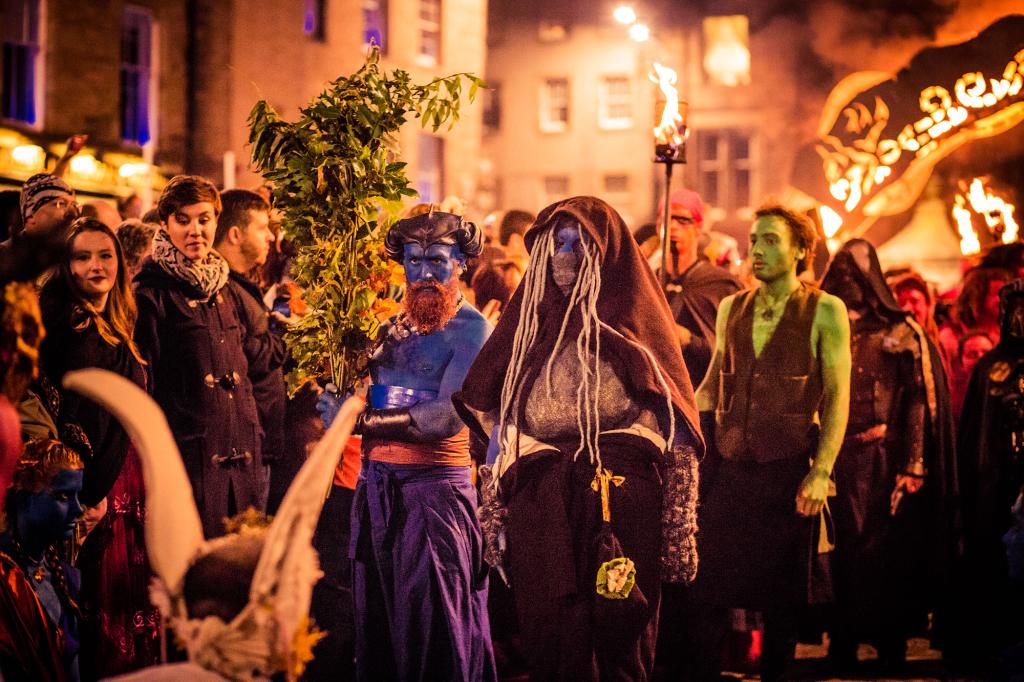 Edinburgh, UK - October 31, 2015: Costumed and painted performers in front of a crowd of thousands during the 2015 Samhuinn Fire Festival in Edinburgh's Grassmarket.