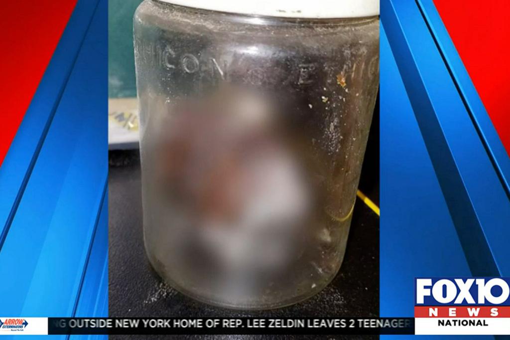 The fetus was found inside the storage unit inside a clear jar.