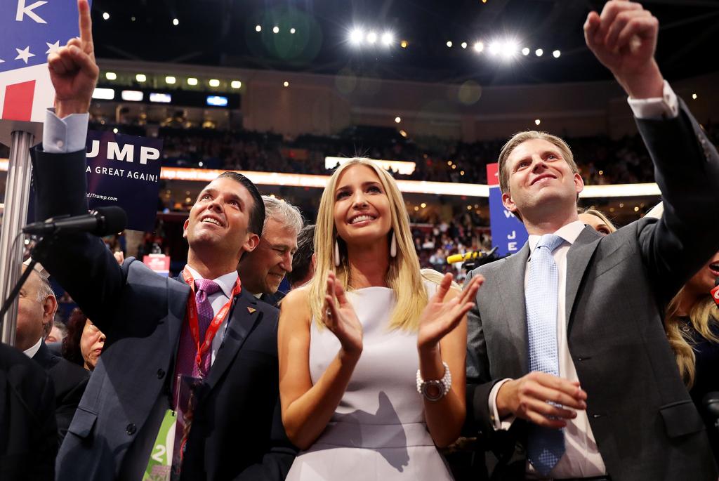 Donald Trump Jr. (L), along with Ivanka Trump (C) and Eric Trump