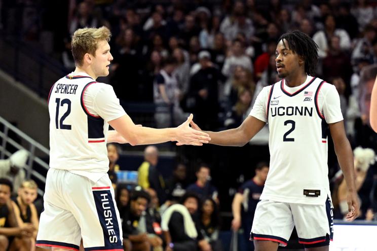 UConn's Cam Spencer (l) and Tristen Newton (r).