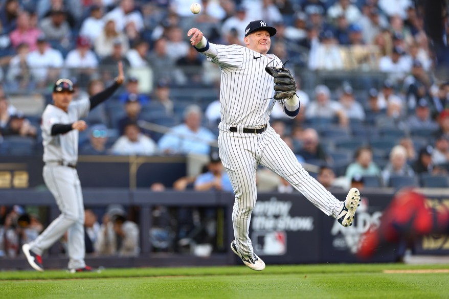 The New York Yankees' Josh Donaldson throws out Owen Miller during the 10th inning of ALDS Game 2 on Oct. 14, 2022 in New York.