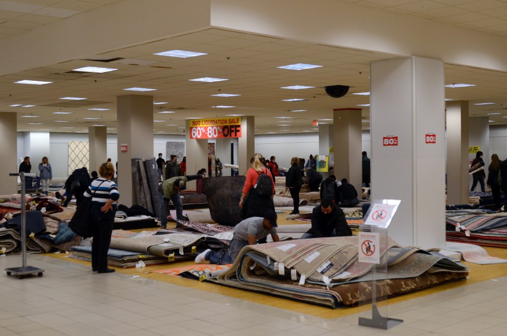 Customers shop at a Sears store as after serving shoppers from around Chicagoland for 50 years, Illinois' last remaining Sears store is closing its doors for good this weekend, in Chicago, Illinois, United States on November 14, 2021 (Photo by Jacek Boczarski/Anadolu Agency via Getty Images)