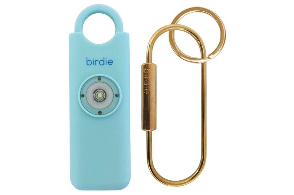 She's Birdie personal alarm in blue with key ring to the side.