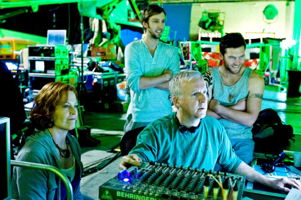 AVATAR, from left: Sigourney Weaver, Joel Moore, director James Cameron, Sam Worthington, on set, 2009, ph: Mark Fellman/TM & Copyright ©20th Century Fox. All rights reserved/Courtesy Everett Collection Film Still