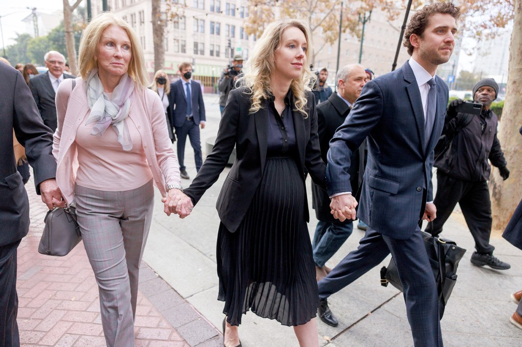Elizabeth Holmes is pictured with her supporters.