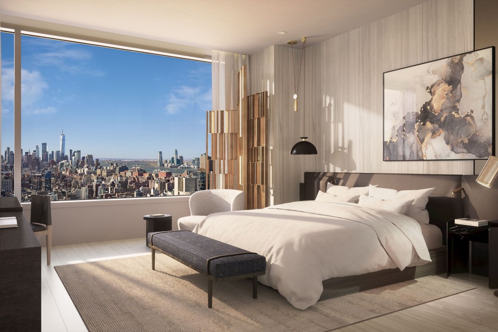 A bedroom with a massive window exposure, and dazzling views south to the World Trade Center.